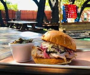 The Gobbler- Smoked turkey on warm brioche bun with our house made toppings